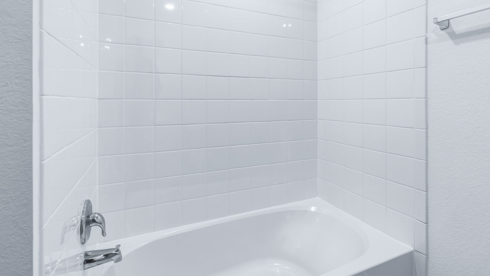 Family full bathroom 2, stylish vanity, mirror, refined fixtures, cabinets, upmarket tub-shower combo