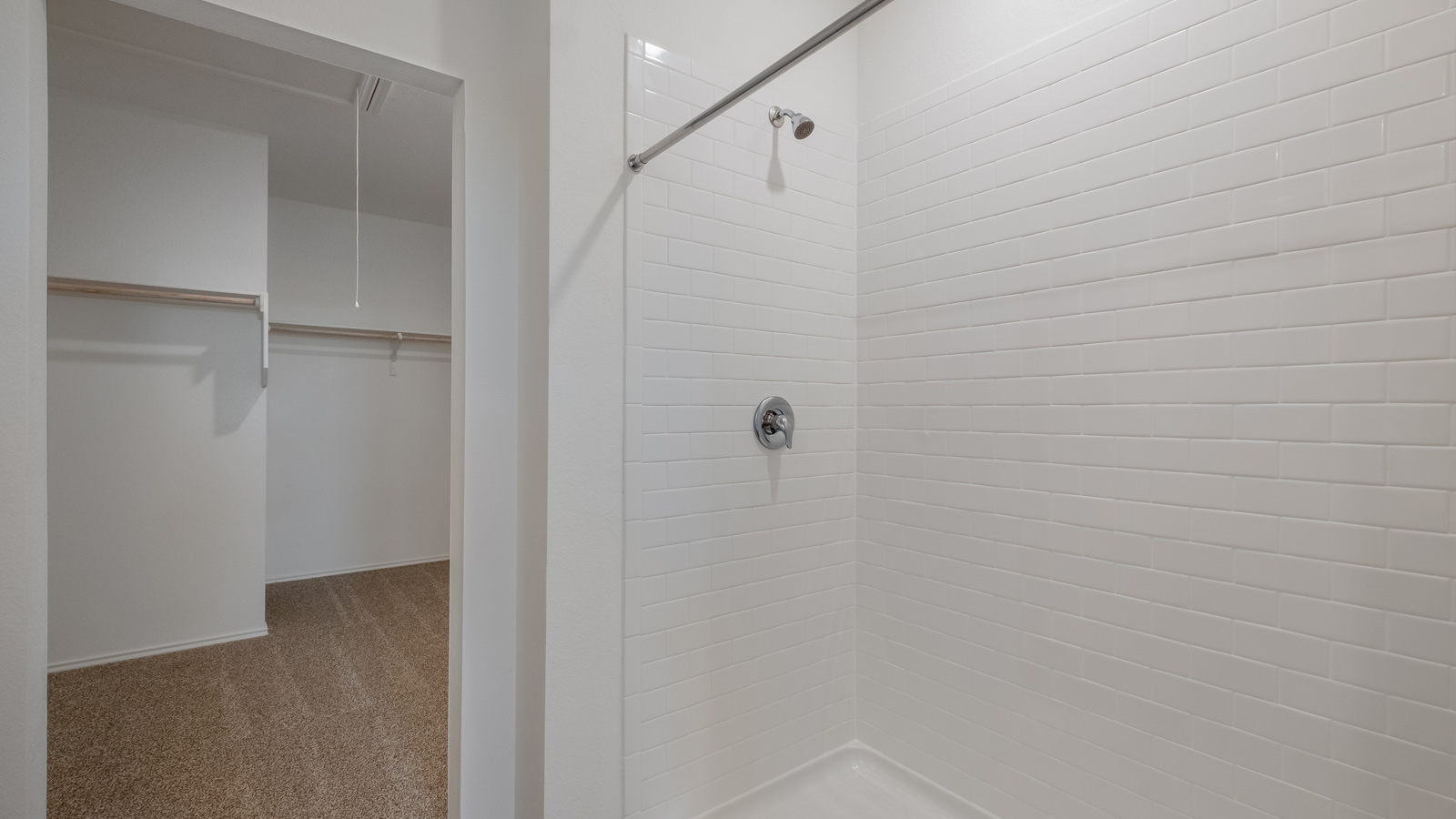 Bathroom 1 with walk-in shower and large walk-in closet.