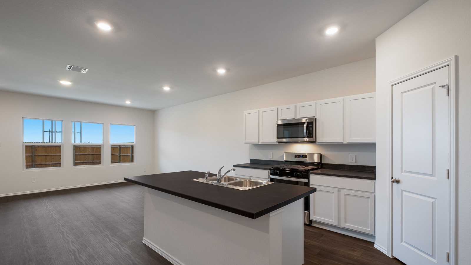 Gourmet kitchen with stainless steel appliances.