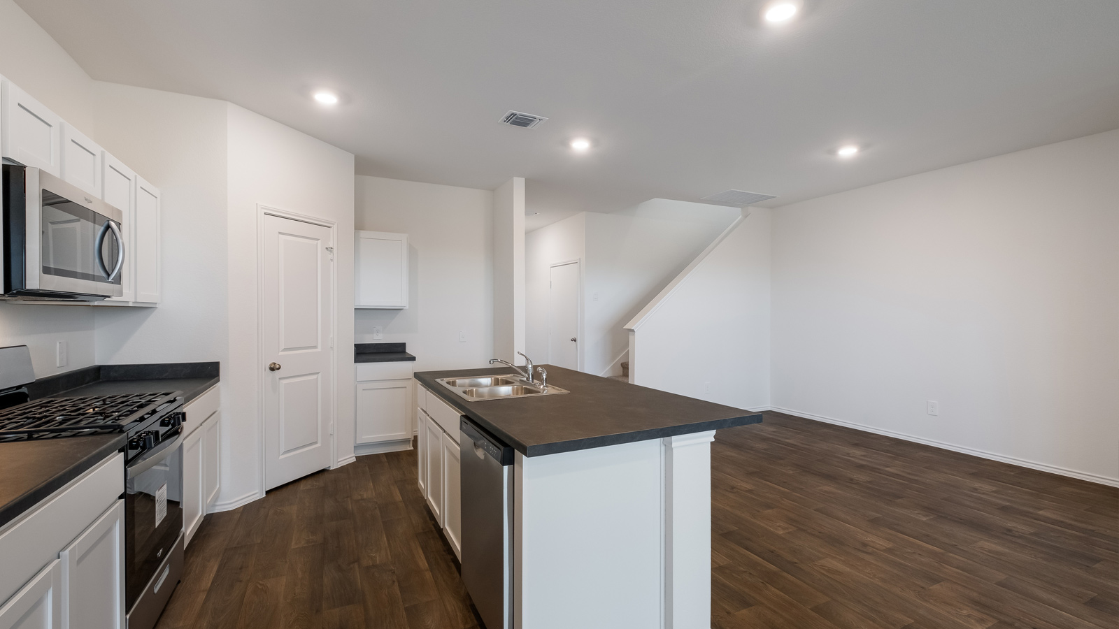 Gourmet kitchen with stainless steel appliances.