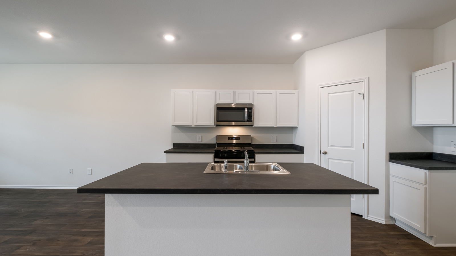 Gourmet kitchen with stainless steel appliances.