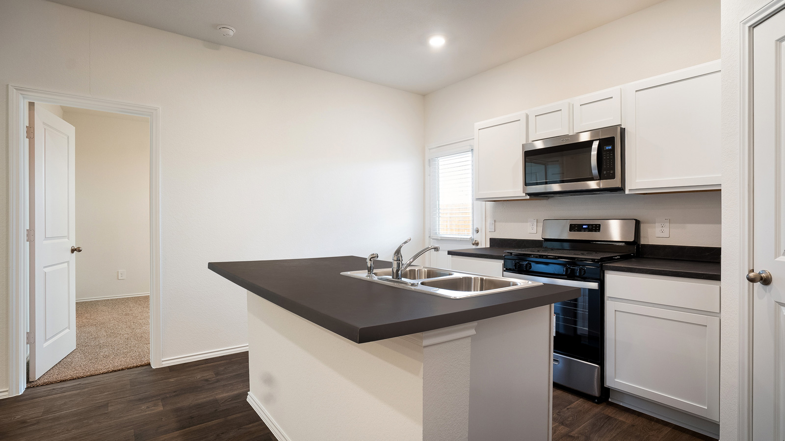 Kitchen with stainless steel appliances.
