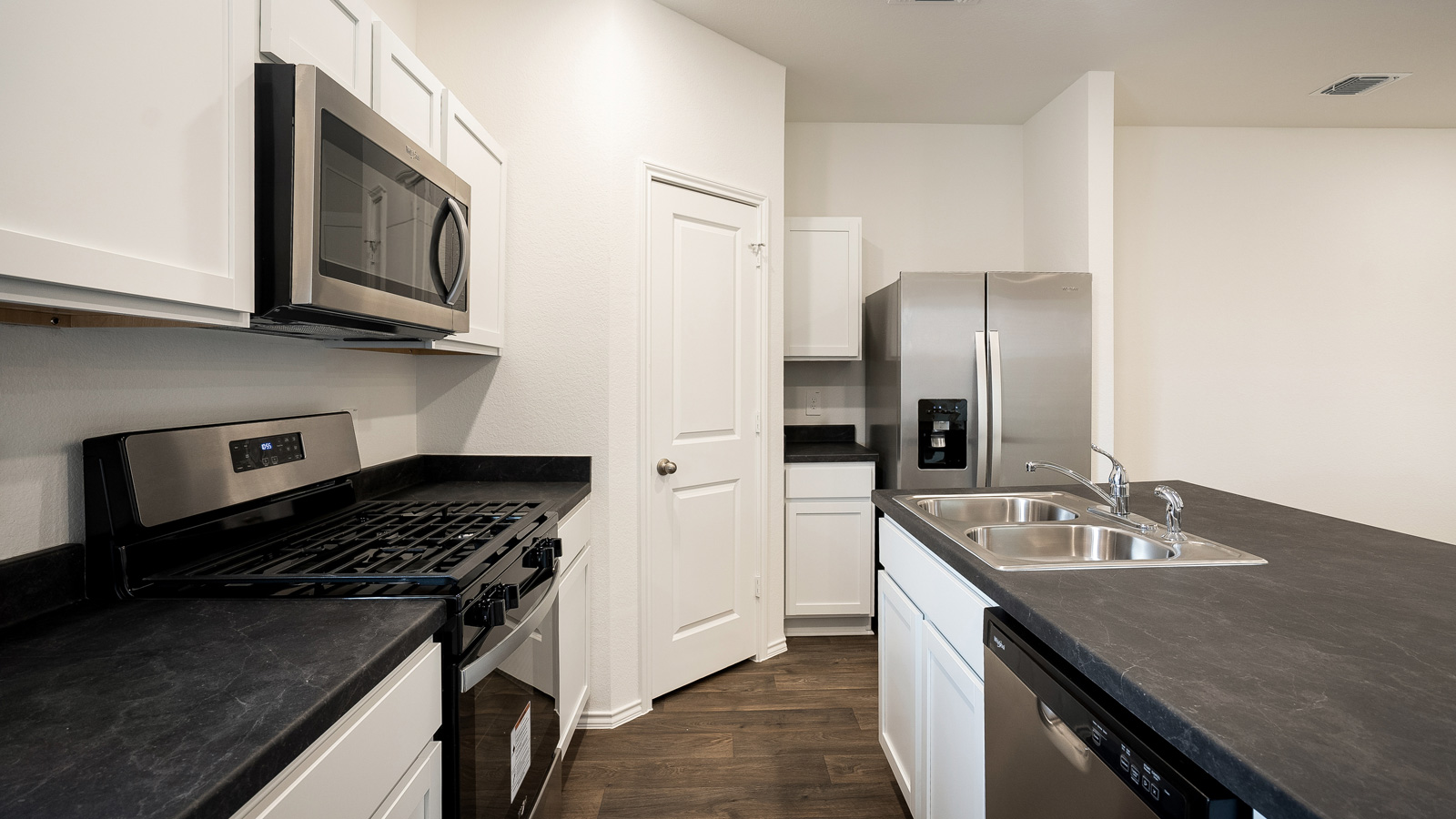 Kitchen with stainless steel appliances.