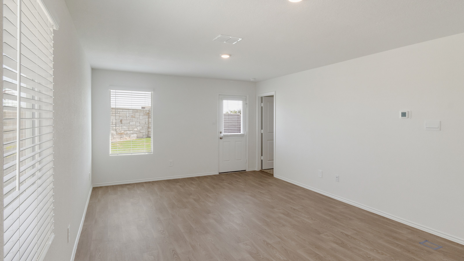 Living room features quality flooring, recessed LED lighting, and a Fresh Open Concept flow to the kitchen
