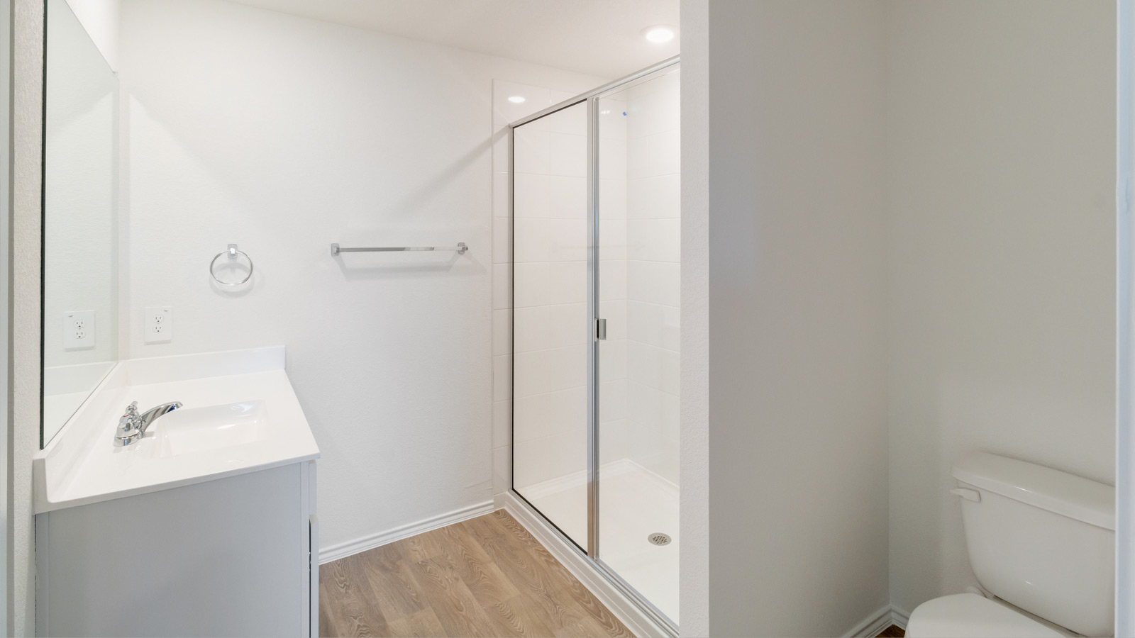 Owner’s en-suite new build home offers a functional layout with a walk-in closet, and spa-like en-suite shower-bath designs
