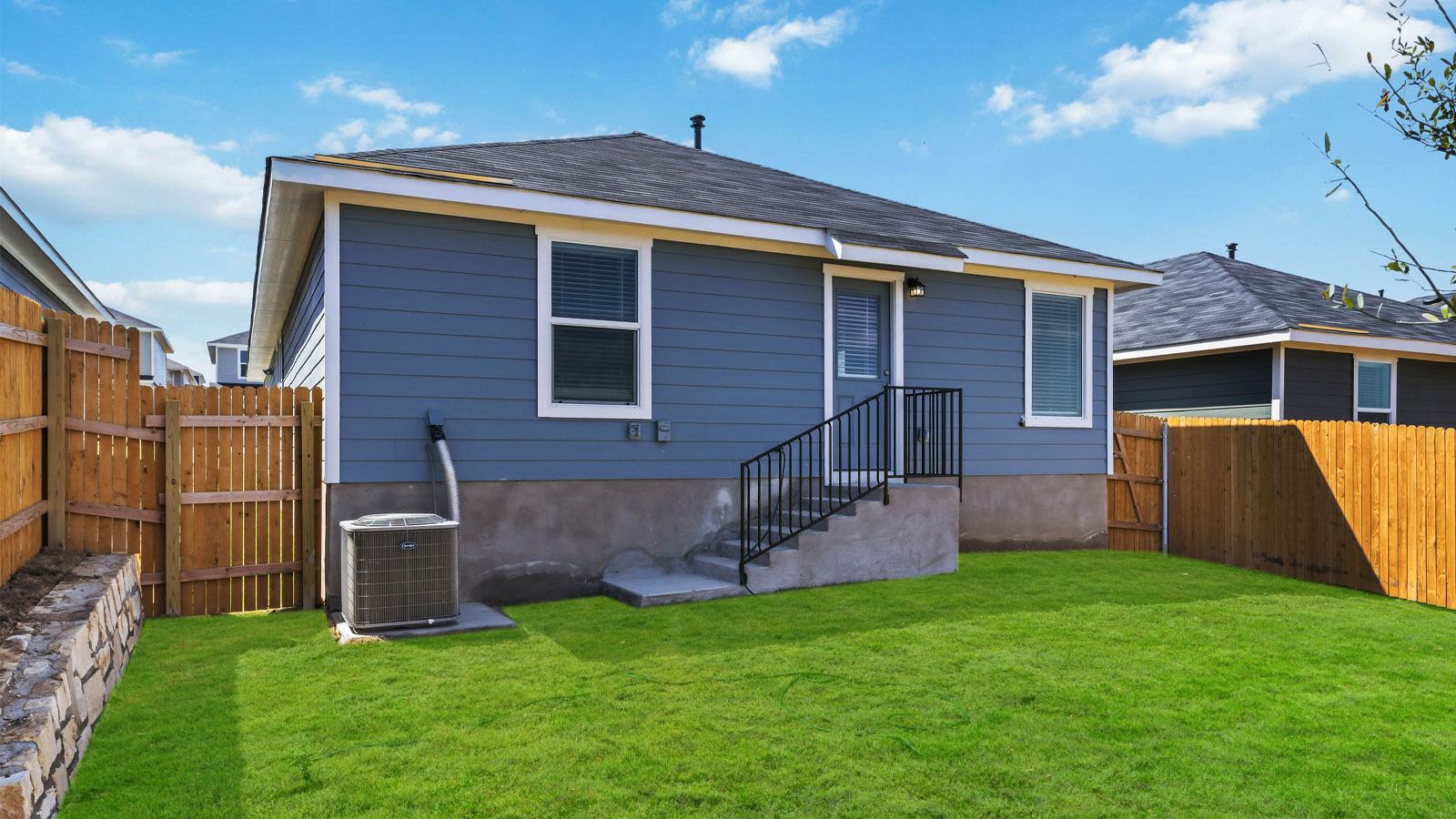 Backyard and exterior of home.