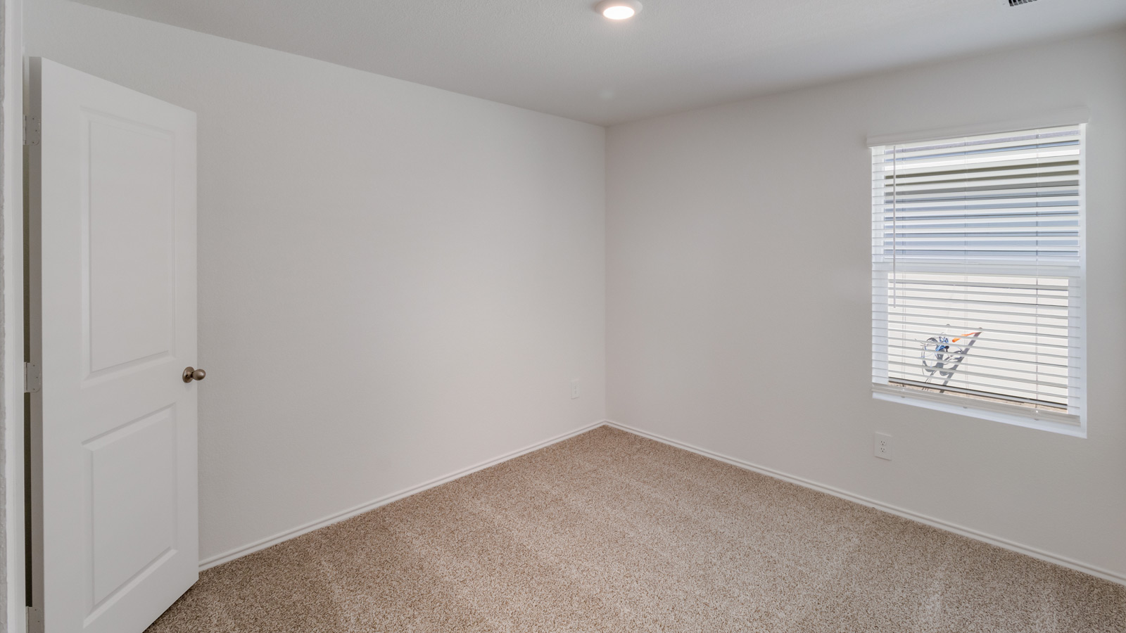 Spacious D.R. Horton flex room offering versatile design potential in a new home setting