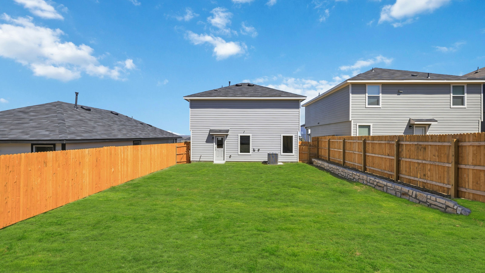 Backyard and exterior of home.