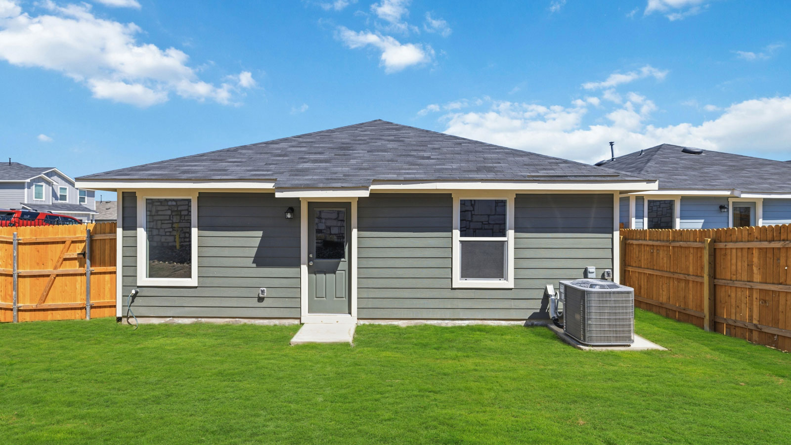Exterior and backyard of house.