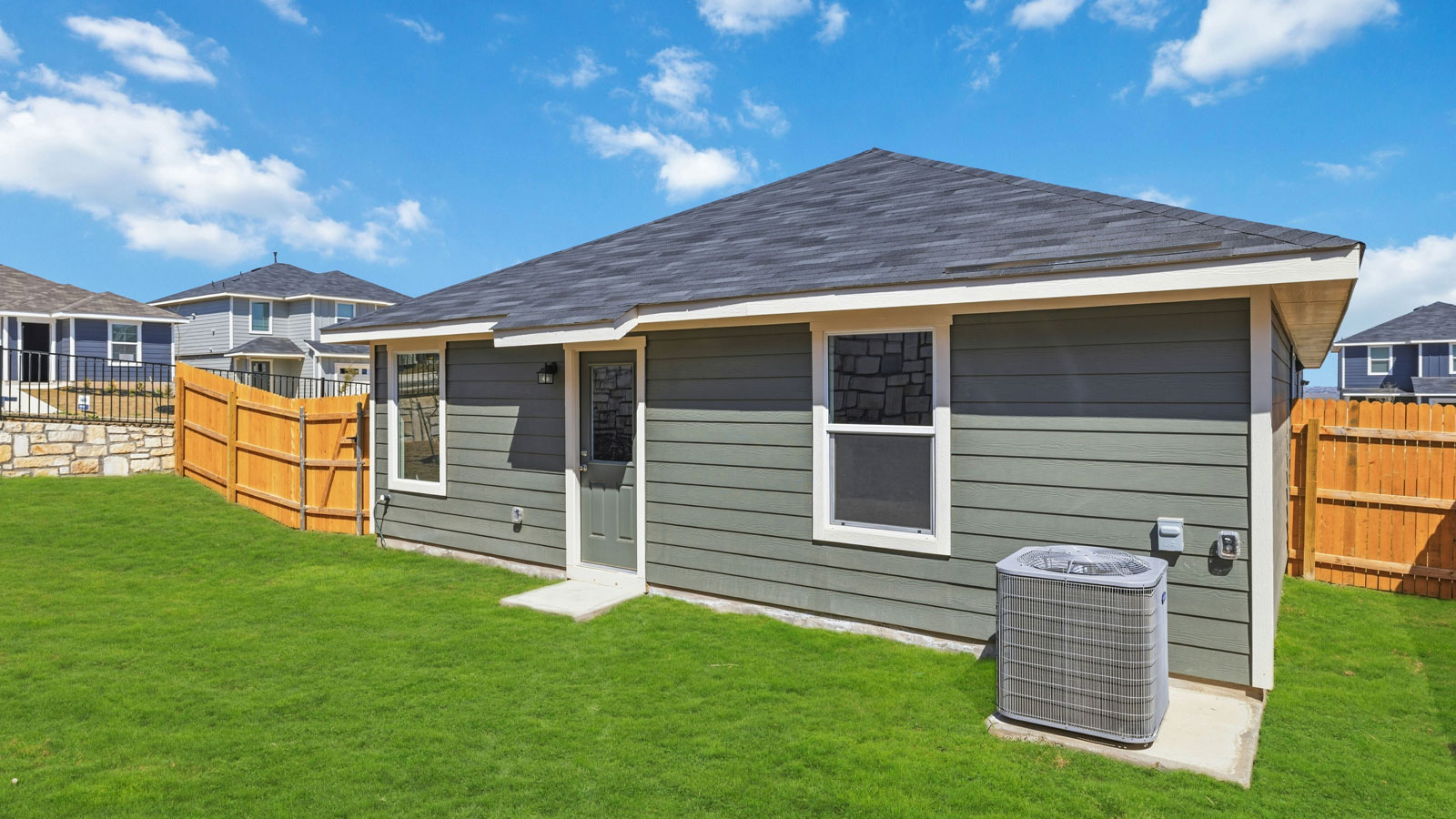 Exterior and backyard of house.