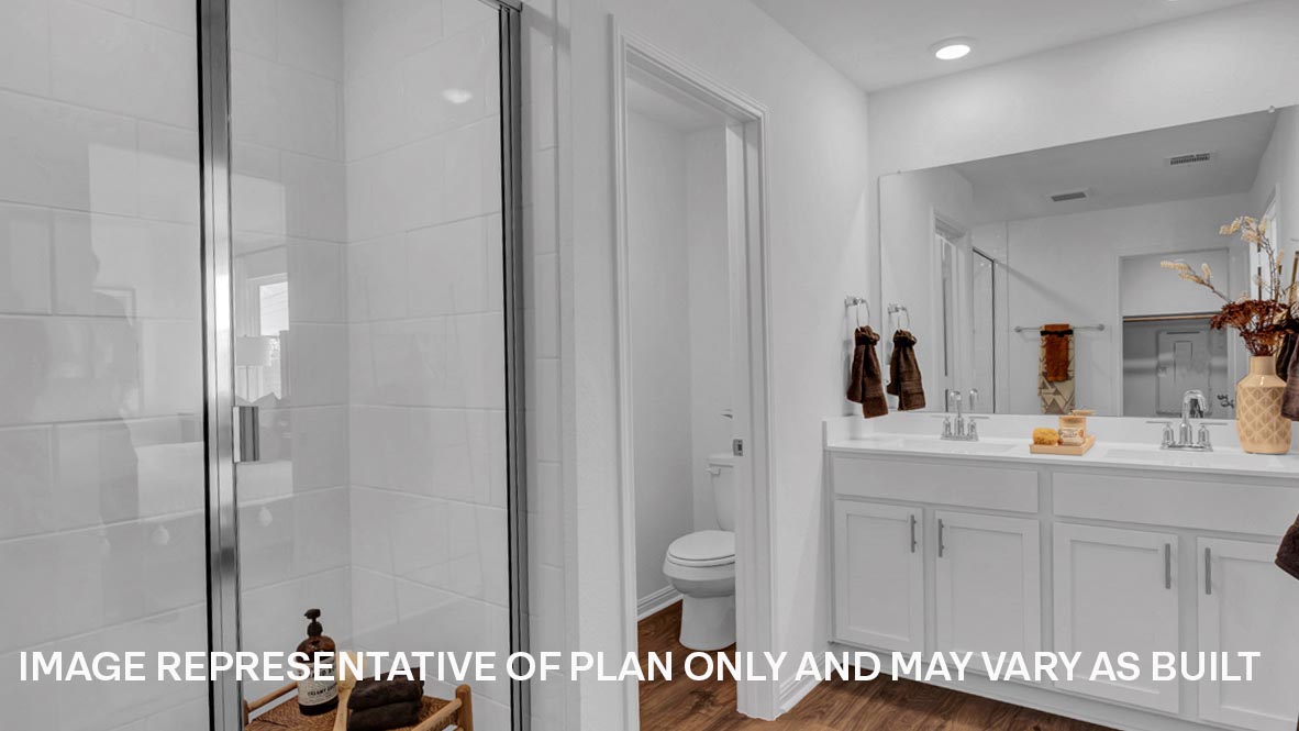 Primary bathroom with walk-in shower.