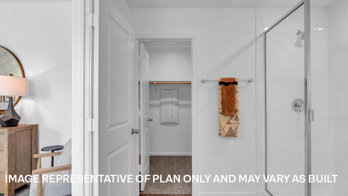 Primary bathroom with walk-in shower.