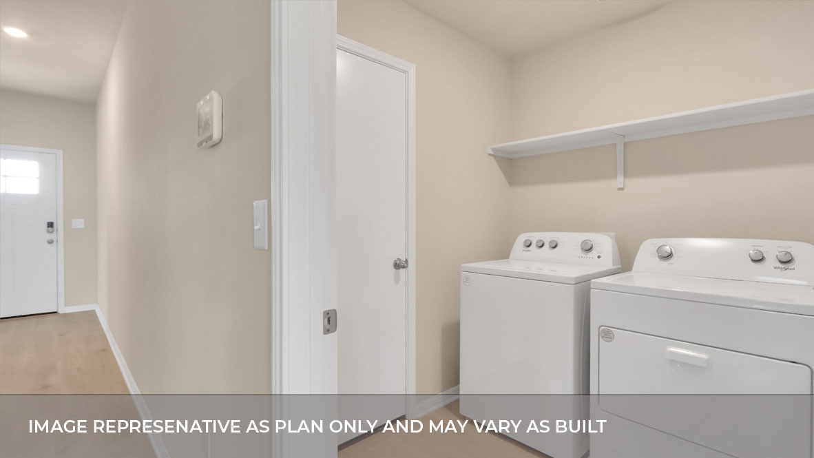 Laundry room located off the hallway.