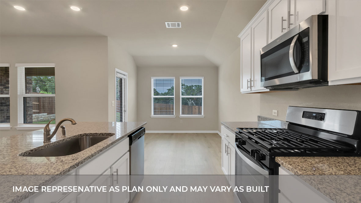 Stainless steel appliances in the kitchen.