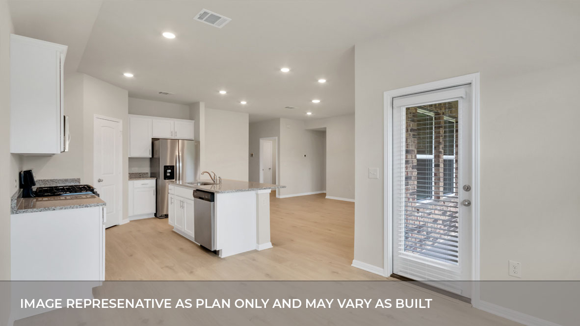 Kitchen seamlessly flows into the dining area.