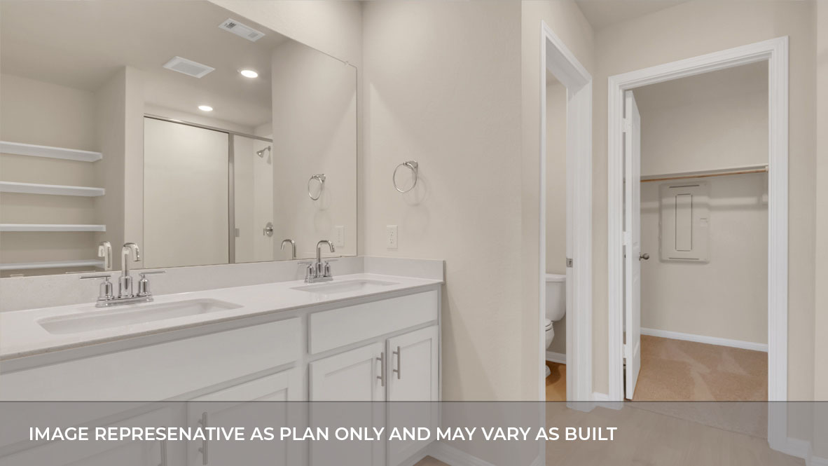 Bathroom 1 with double vanity sink.