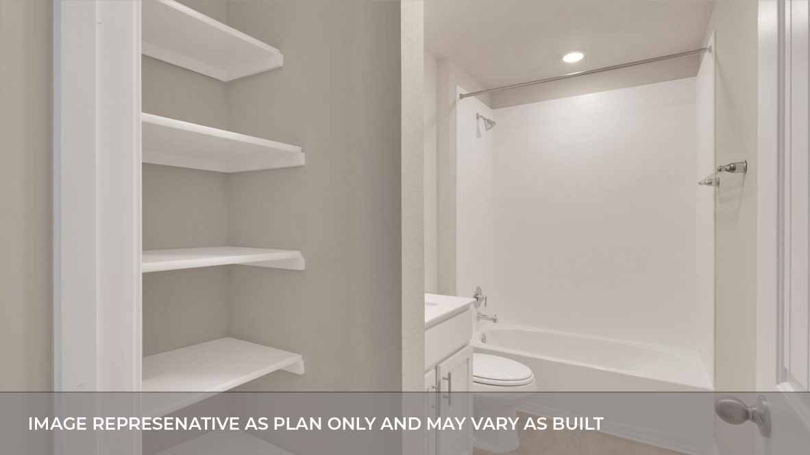 Secondary bathroom with tub.