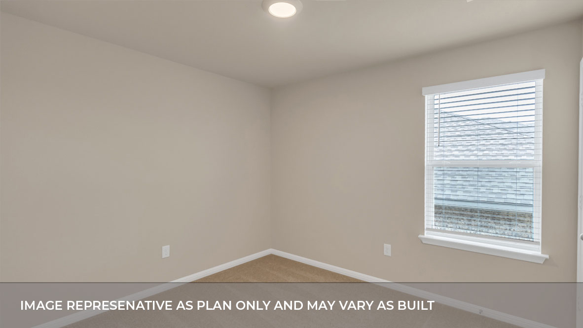 Bedroom 2 with carpeted floors and closet.