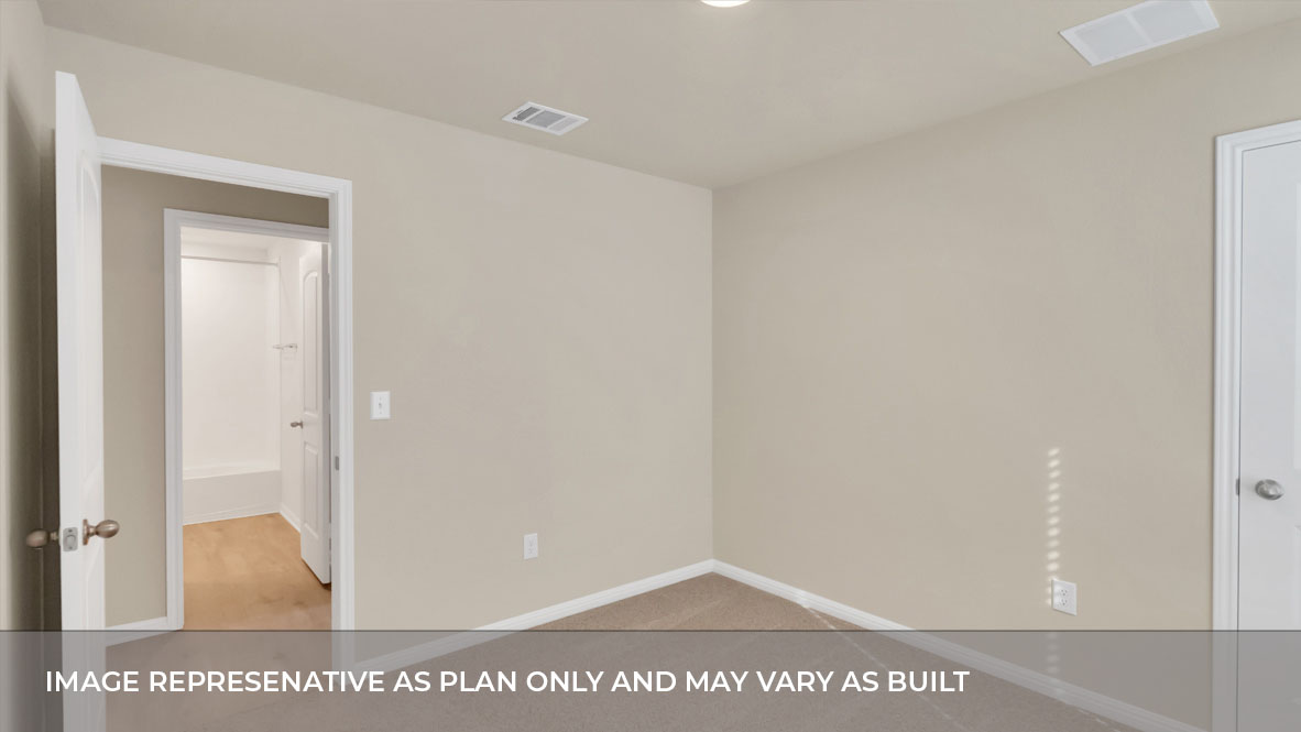 Bedroom 3 with carpeted flooring and closet.
