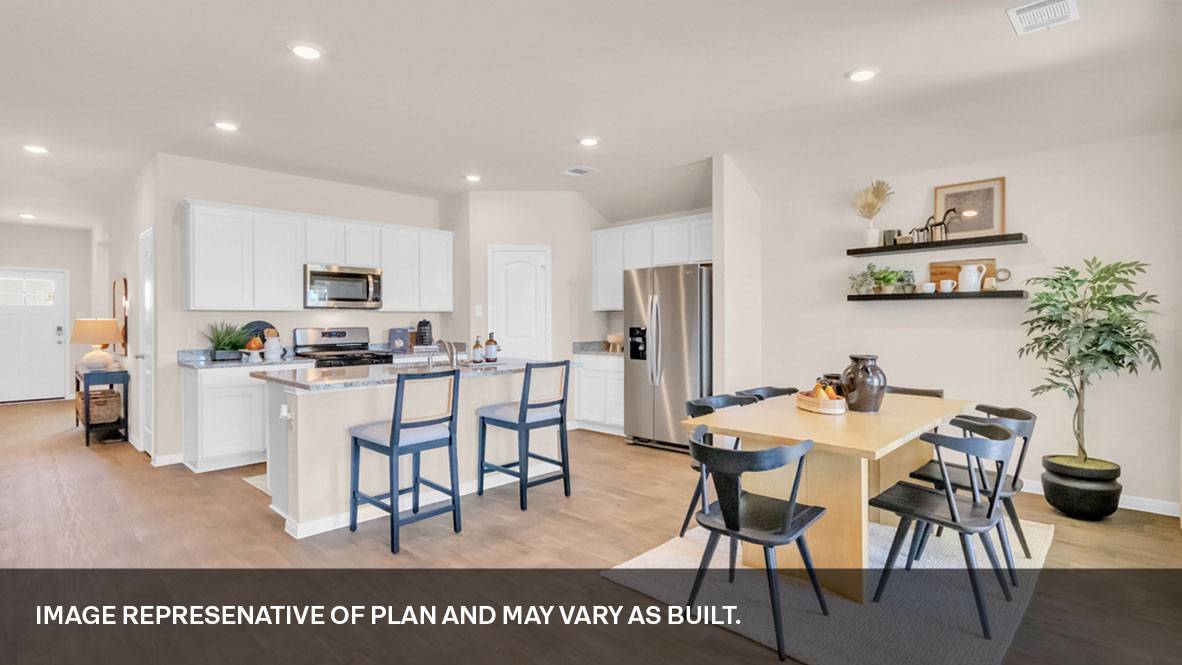 Dining space with kitchen view.