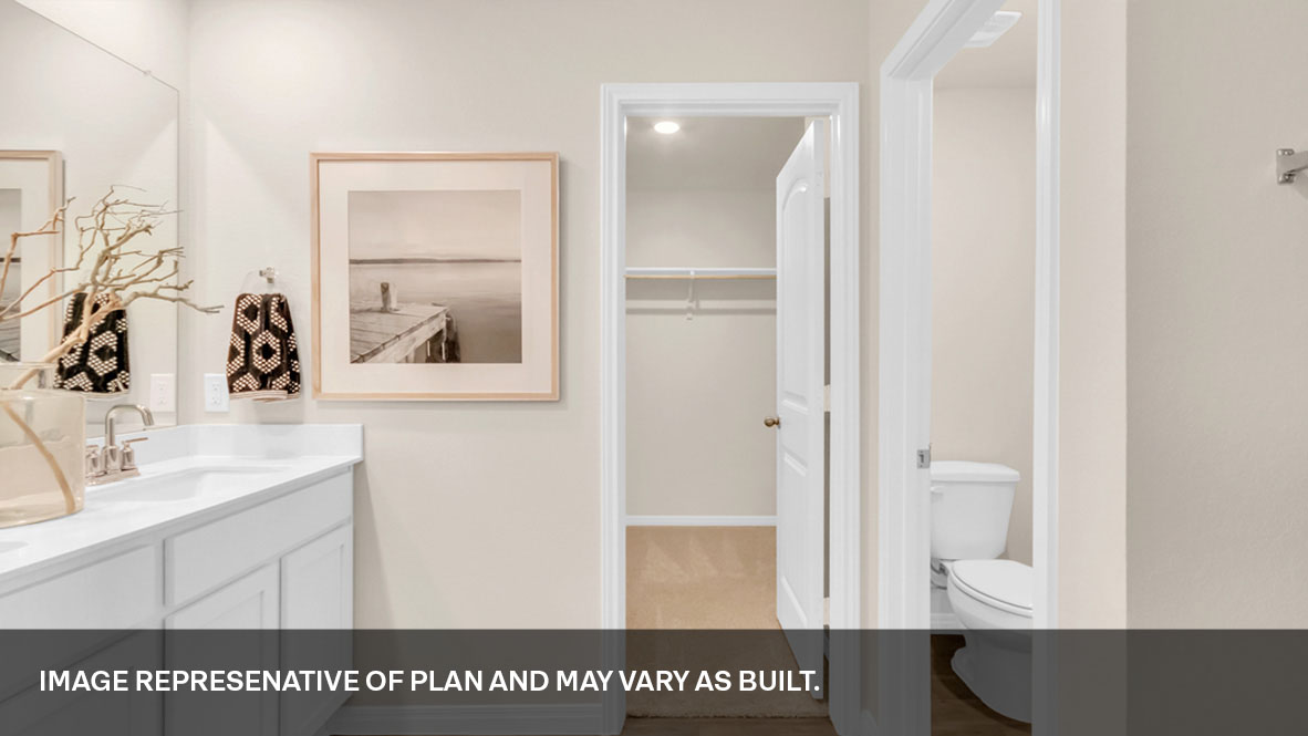 Primary bathroom with closet.