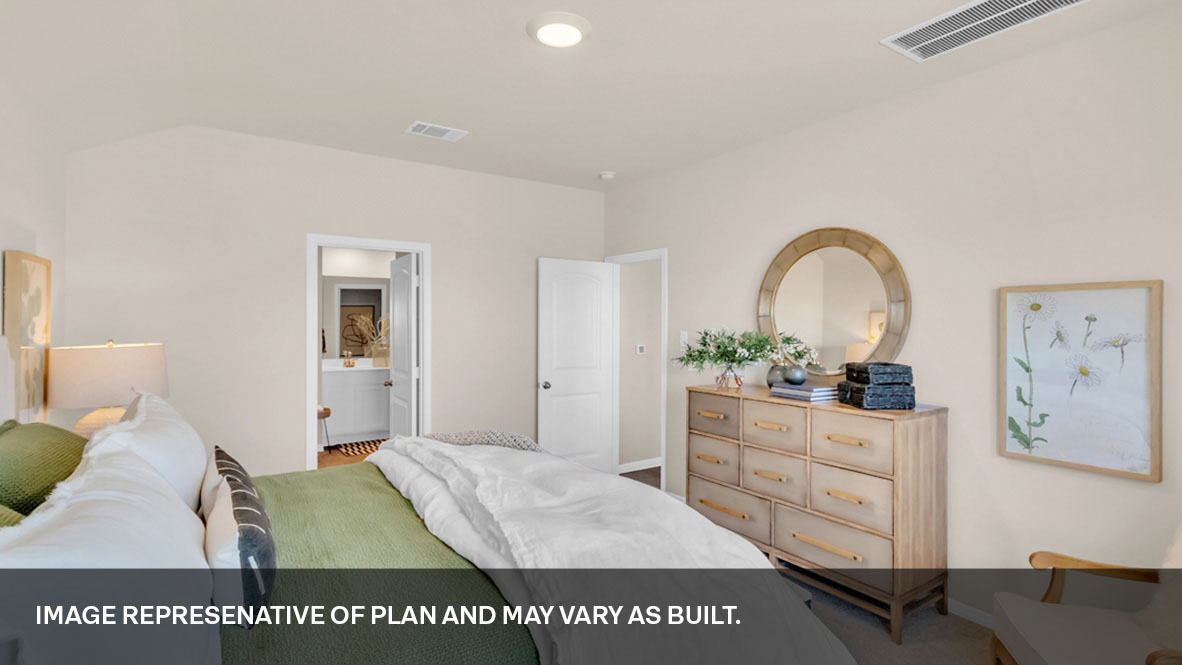 Primary bedroom with natural light.