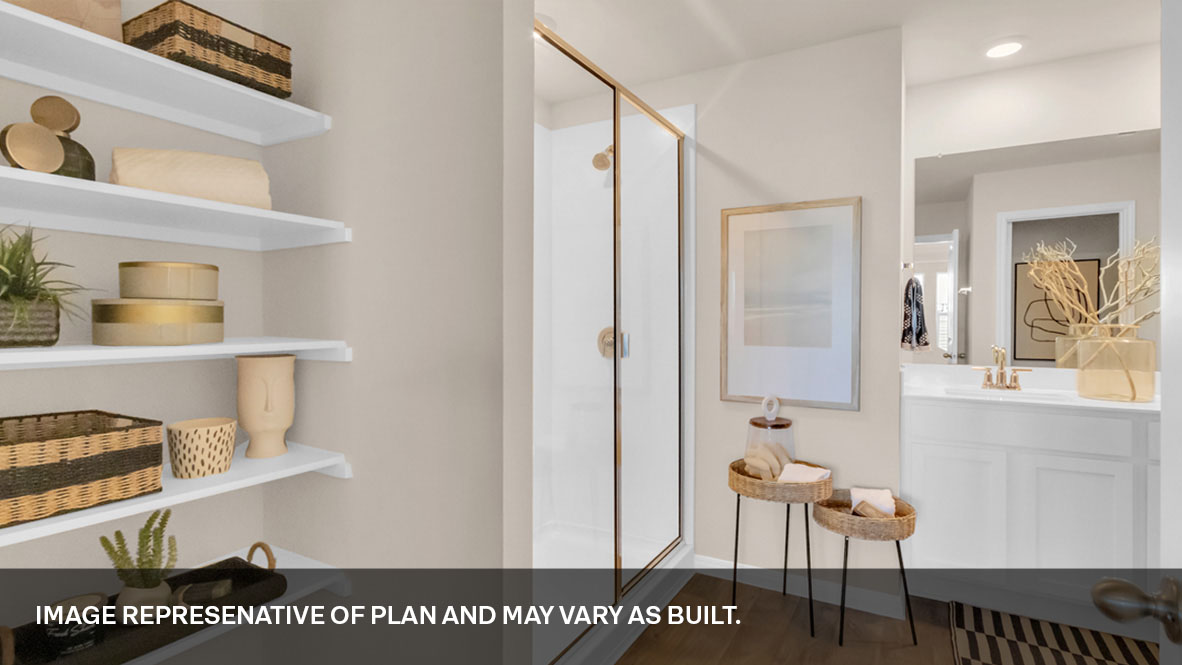 Primary bathroom with shelving.