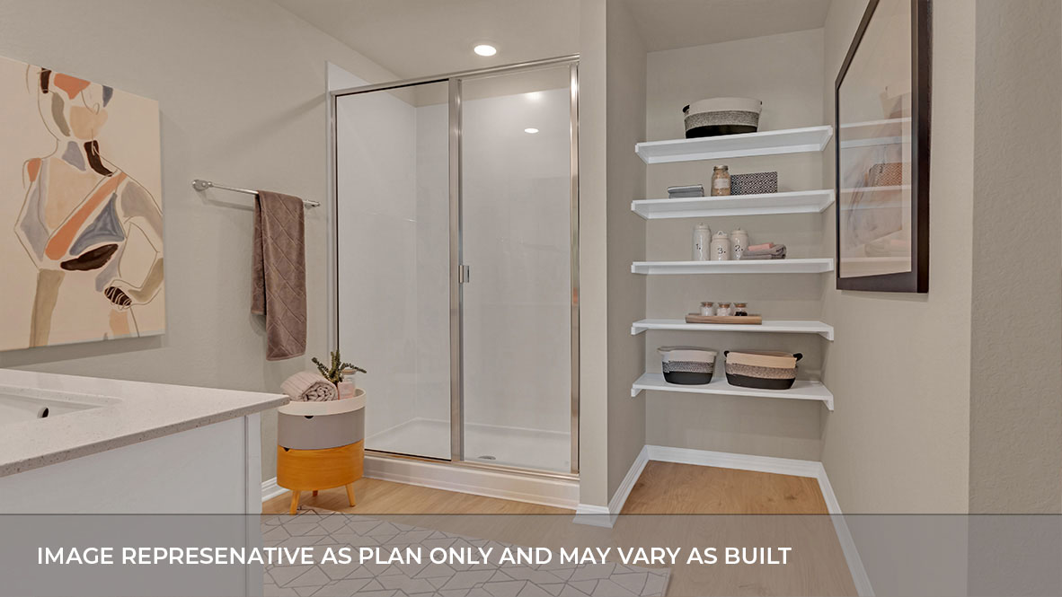 Primary bathroom with shelving.