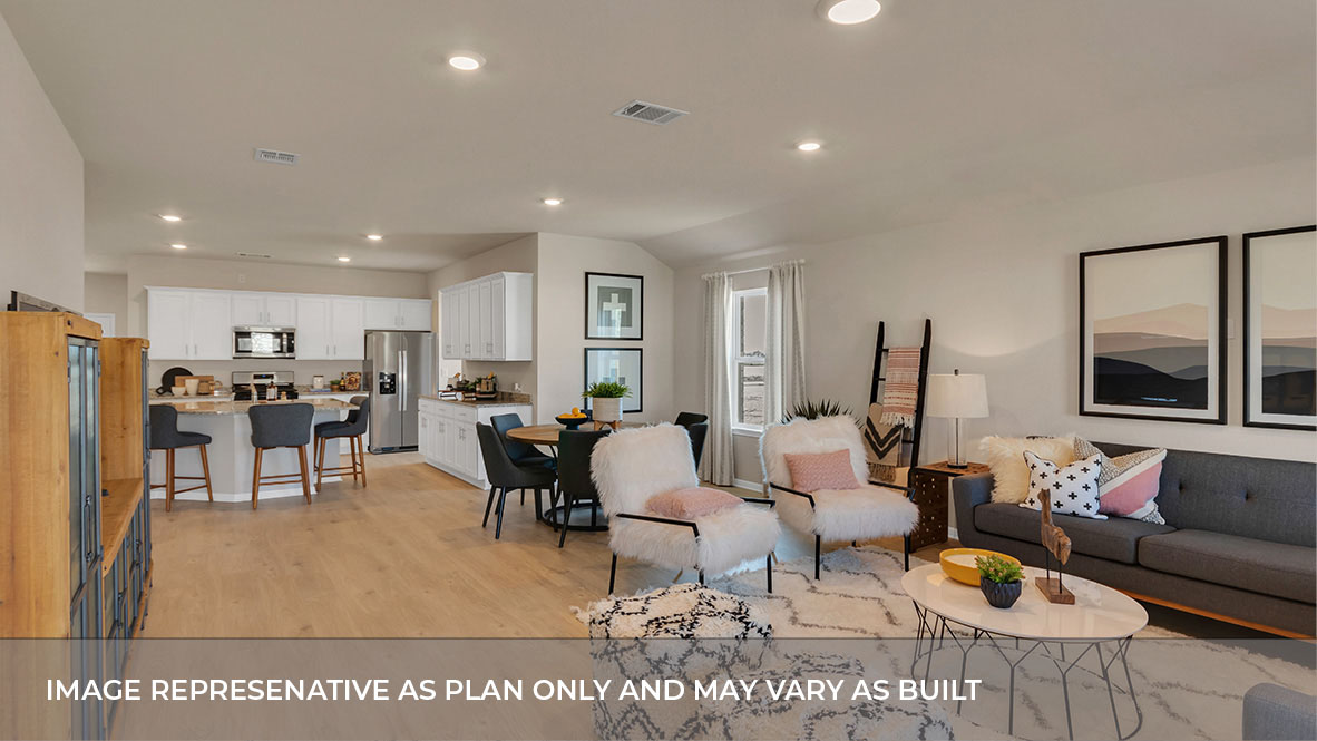 Open living room with large windows.