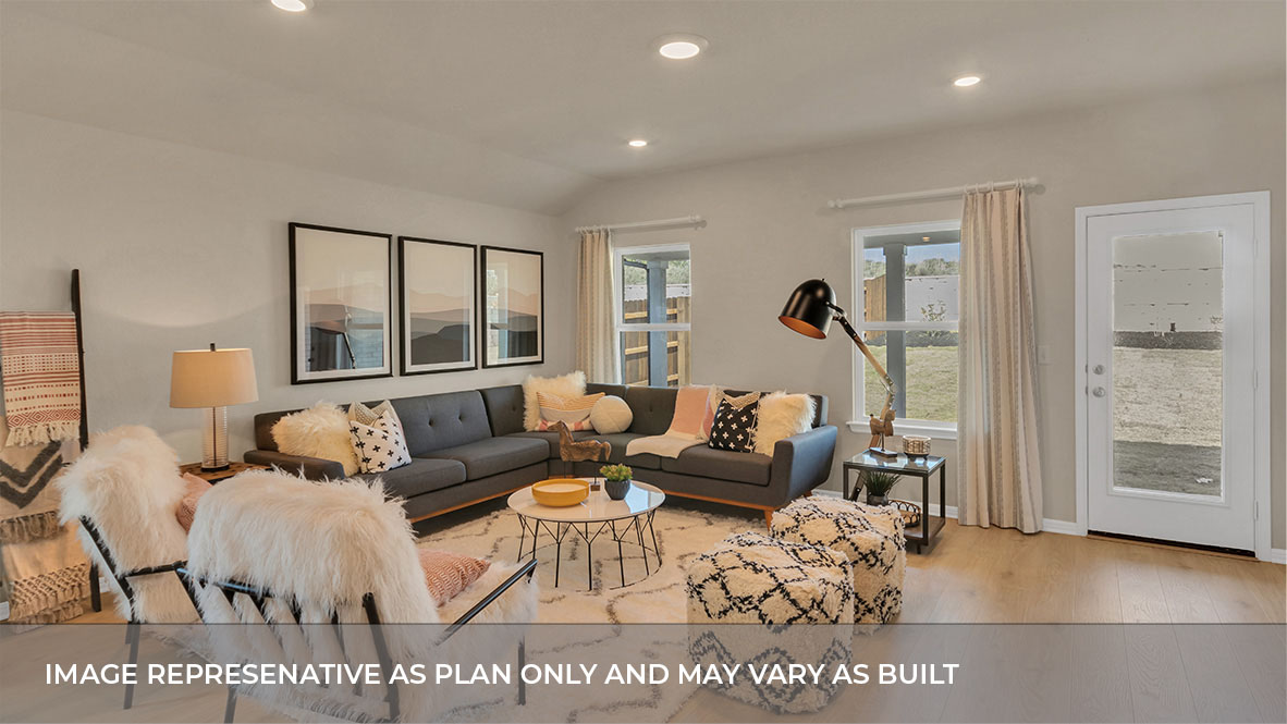 Living area with view of backyard.
