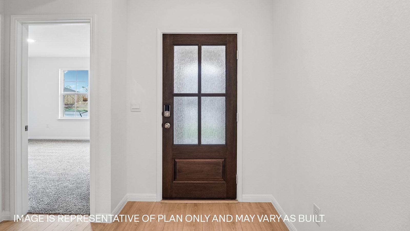 Entryway with beautiful front door.