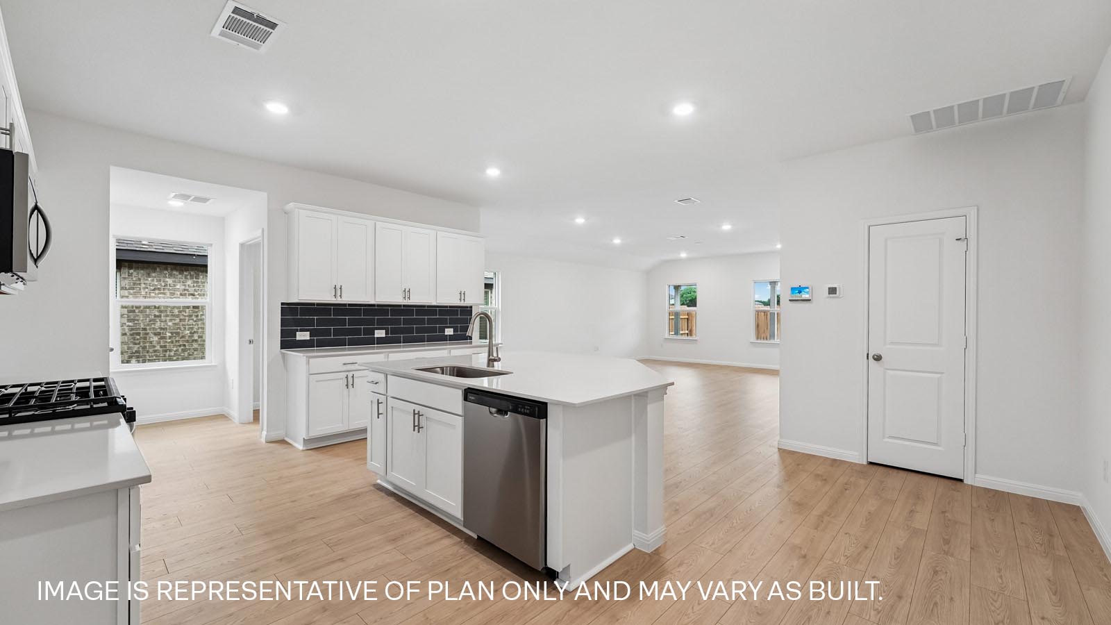 Kitchen with oversized quartz island.