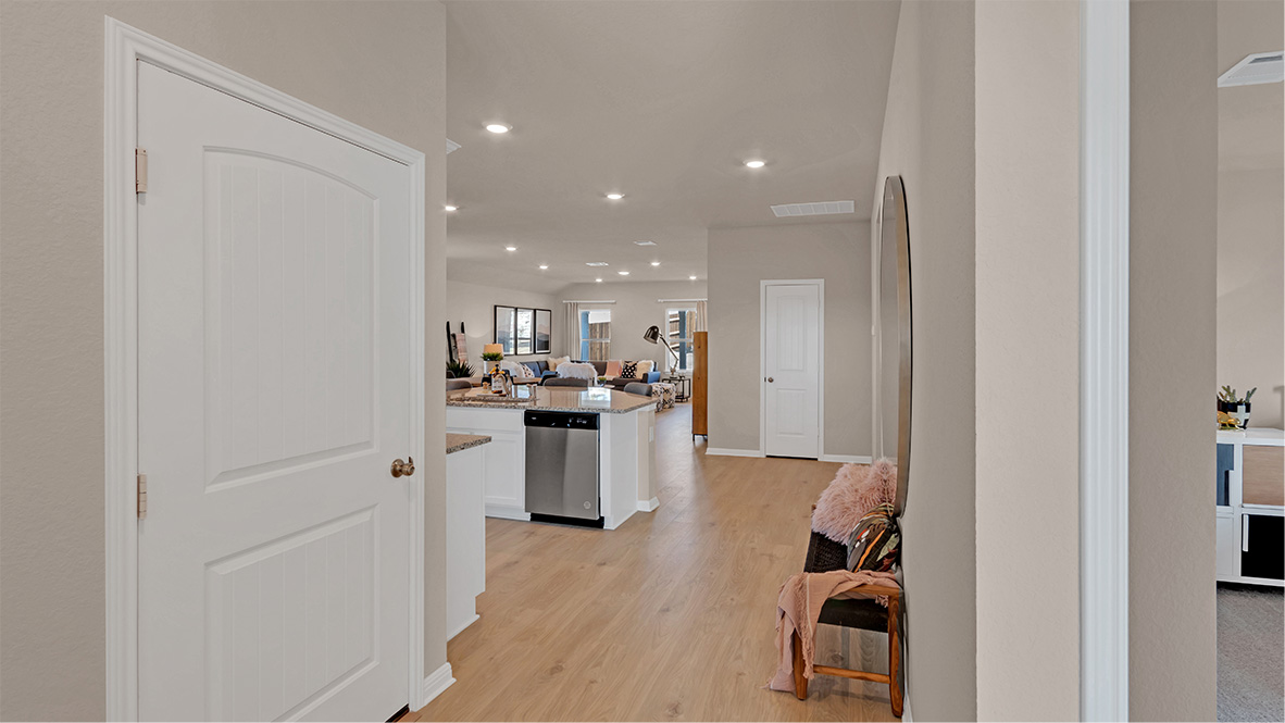 Hallway leading to kitchen and living area.