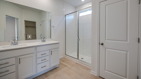Dalton II Floorplan 3508 main bathroom with walk-in shower – Brooks Ranch in Kyle TX