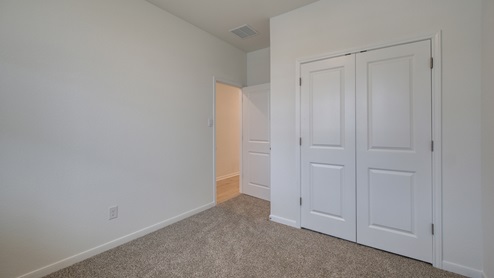 Dalton II Floorplan 3508 secondary bedroom – Brooks Ranch in Kyle TX