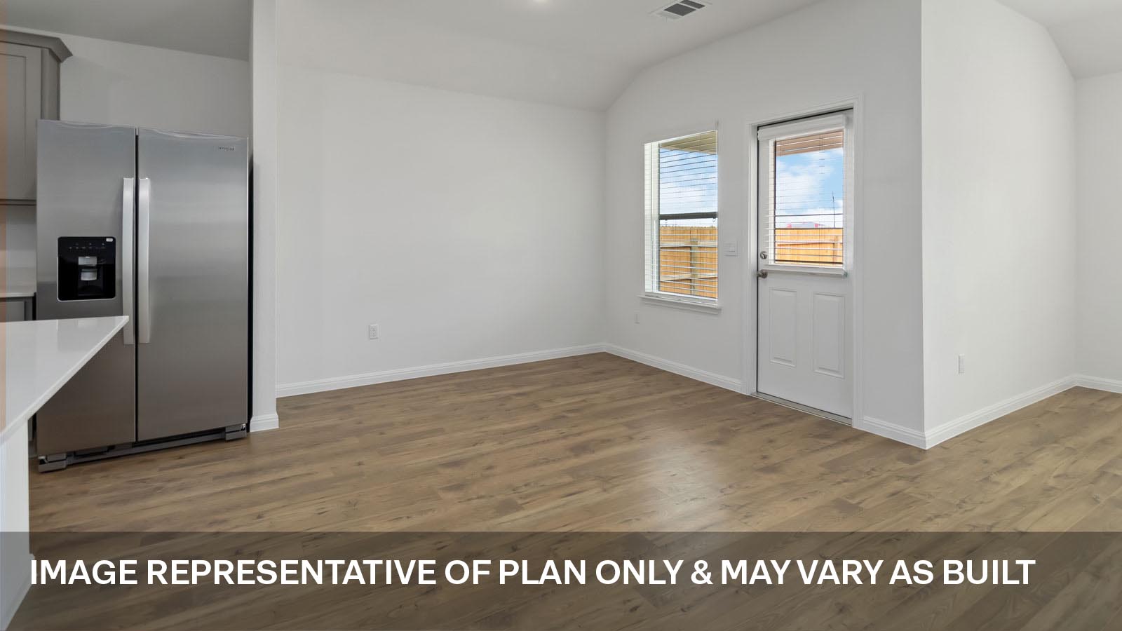 Open concept kitchen and living area.