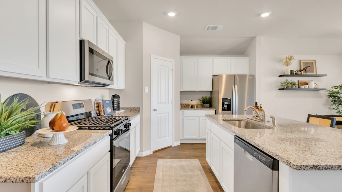 Kitchen with stainless steel appliances.