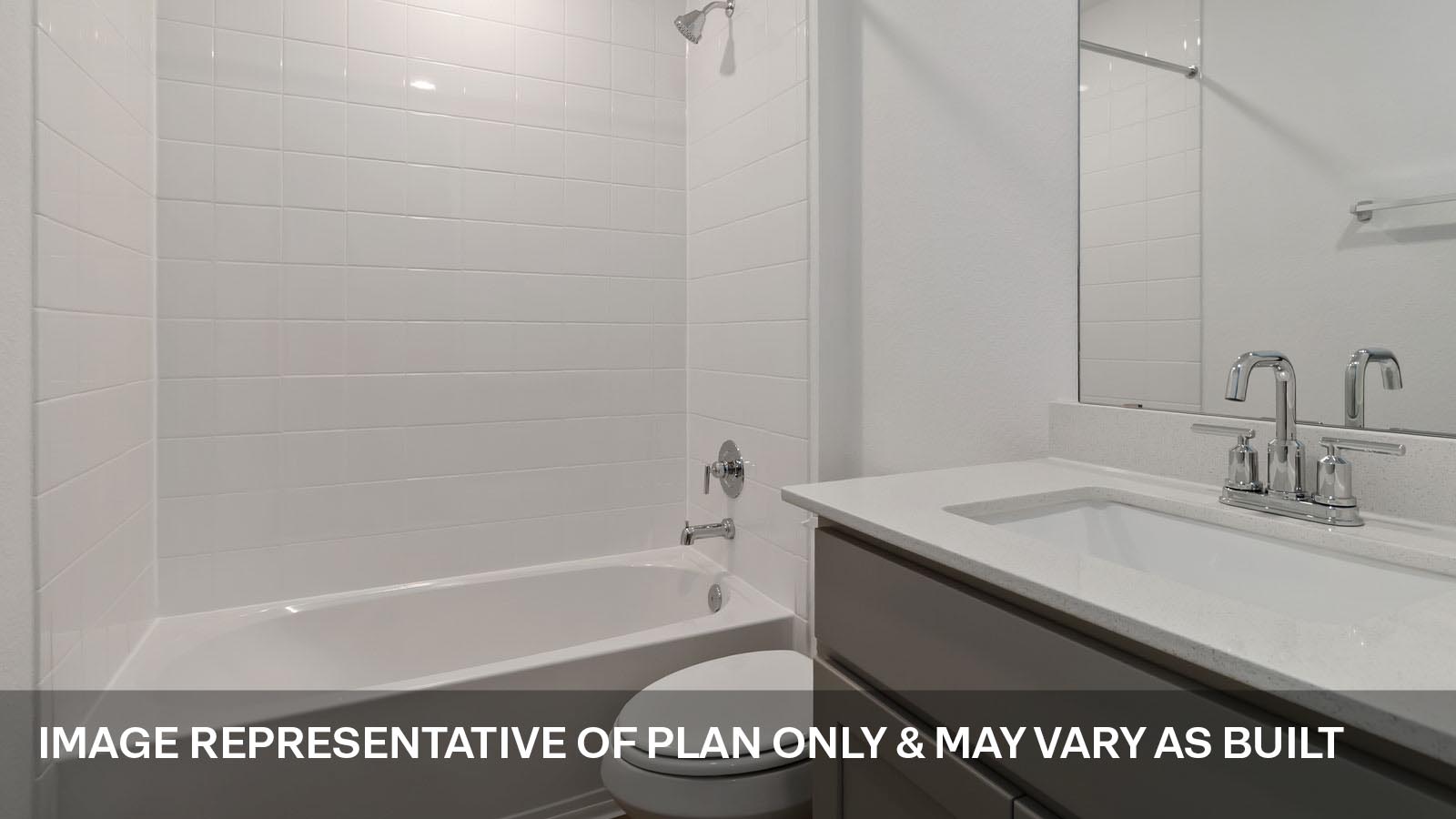 Secondary bathroom with shower and bathtub.