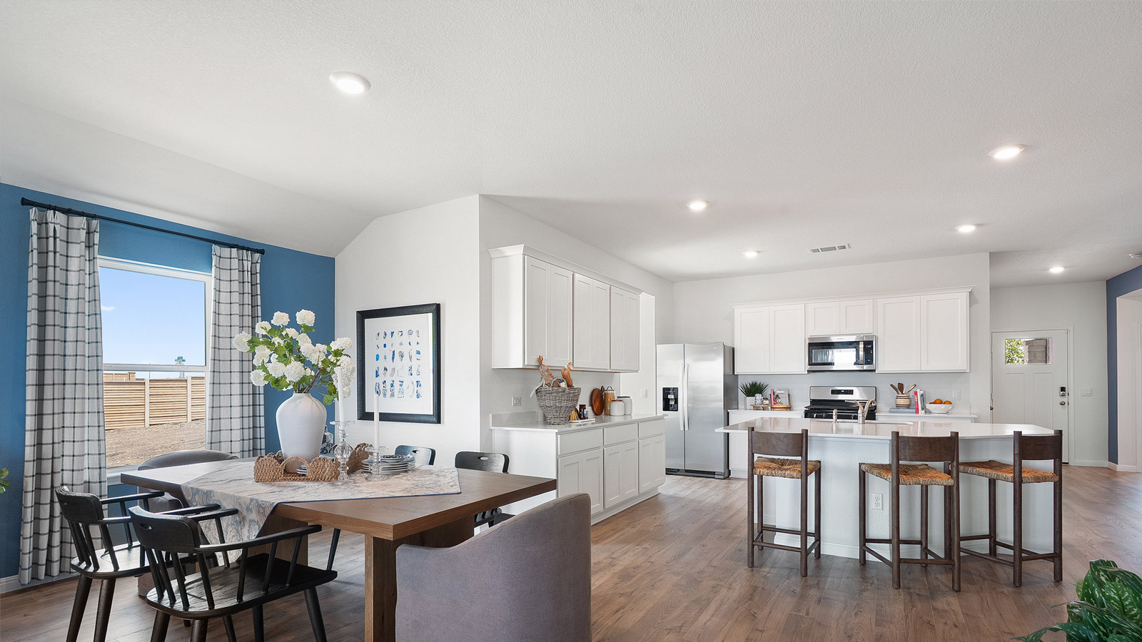 Open-concept dining area and kitchen.