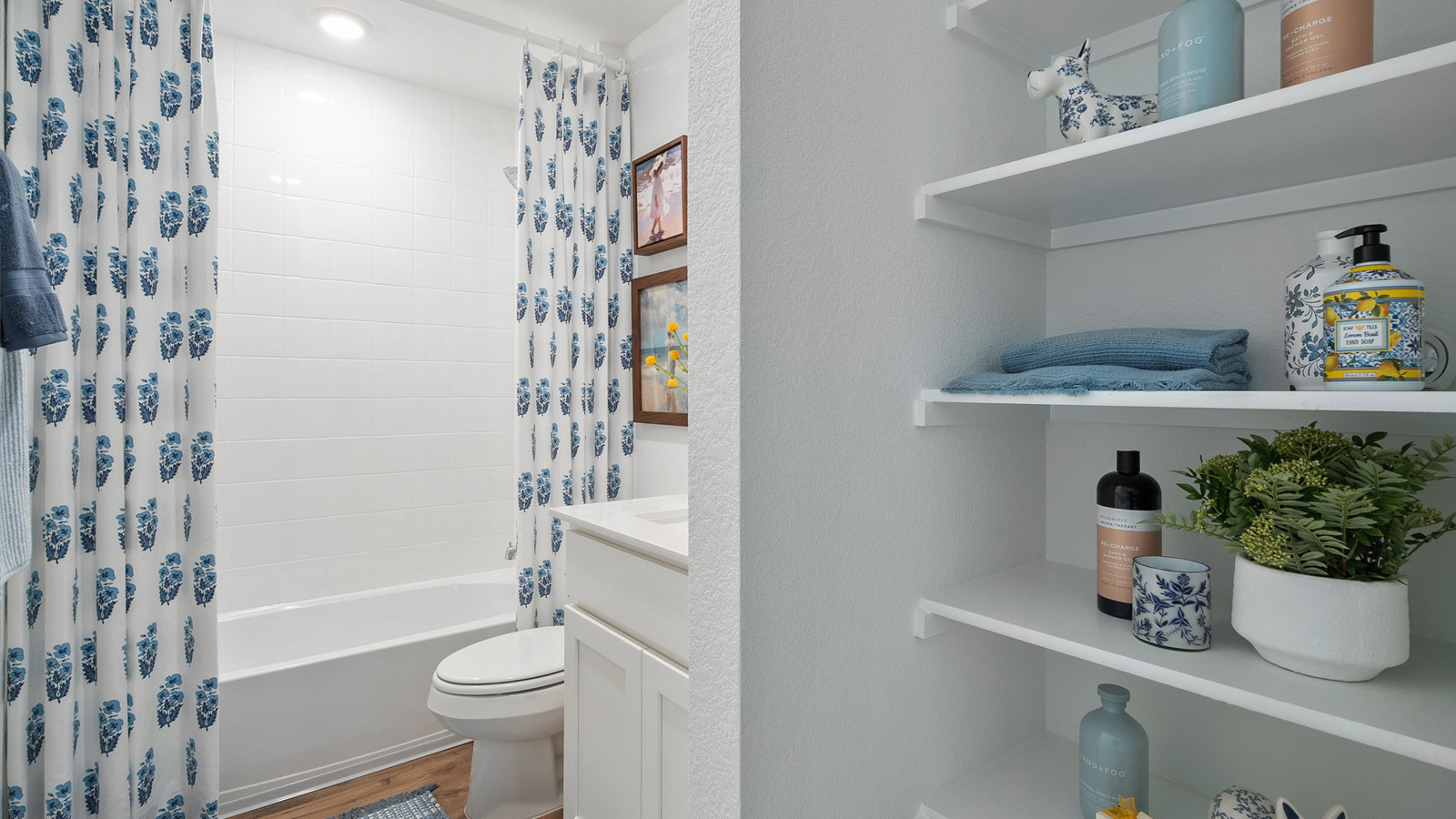 Secondary bathroom with shower and bathtub.