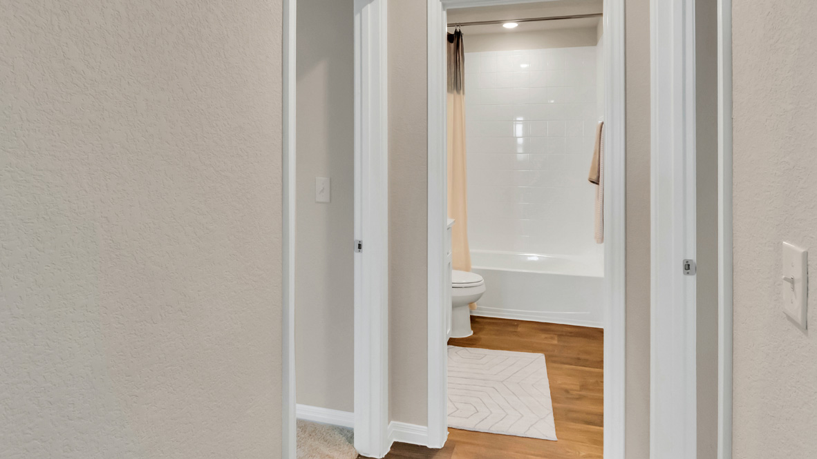 hallway view of a bathroom