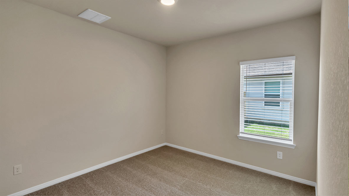 Secondary bedroom on first story.