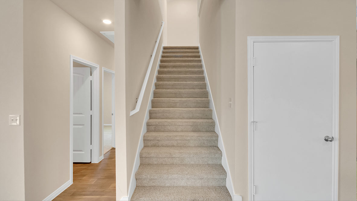 Stairs leading up to second story.