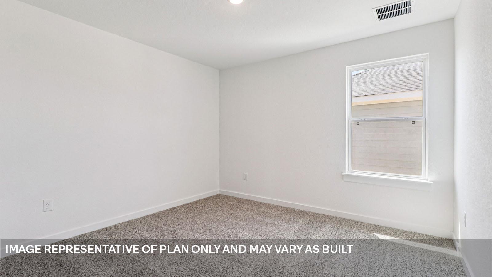 Bedroom 4 with carpeted flooring.