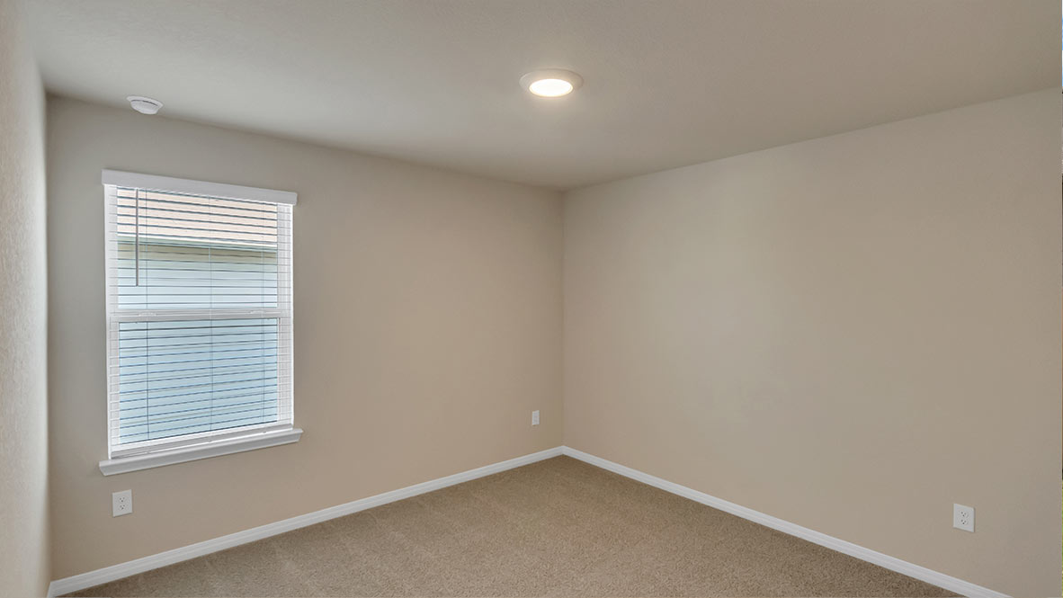 Secondary bedroom lcoated upstairs.