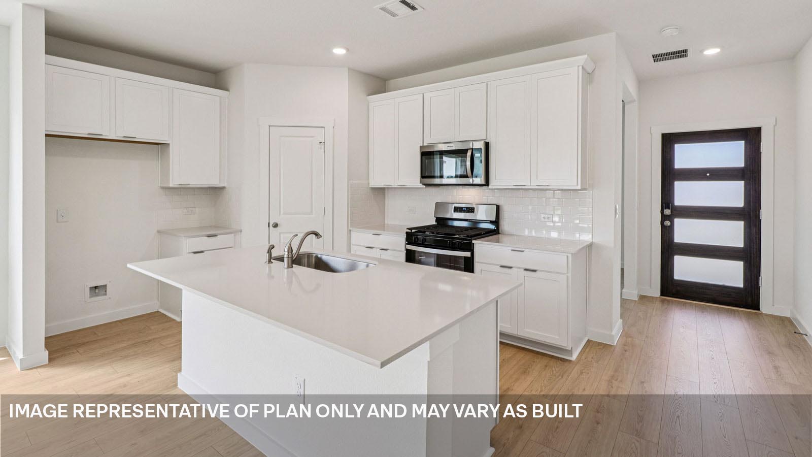Kitchen with stainless steel appliances.