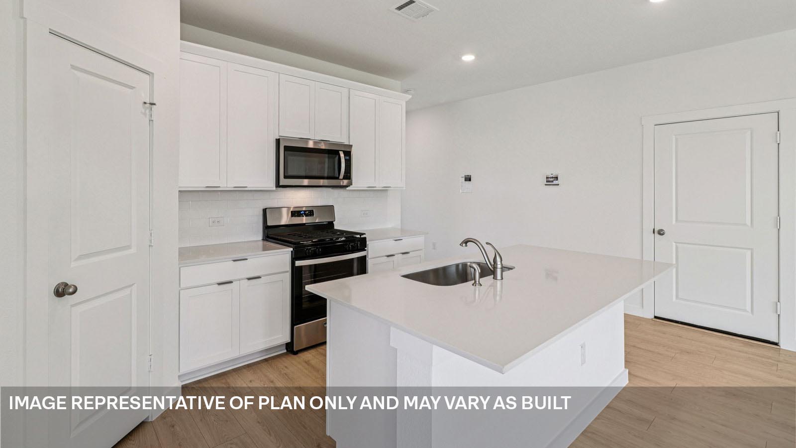 Kitchen with stainless steel appliances.
