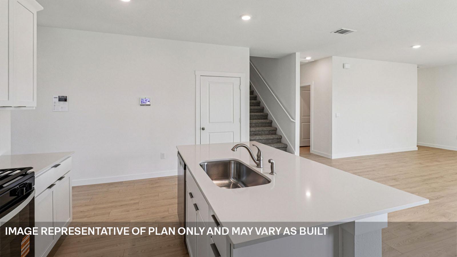 Kitchen with stainless steel appliances.