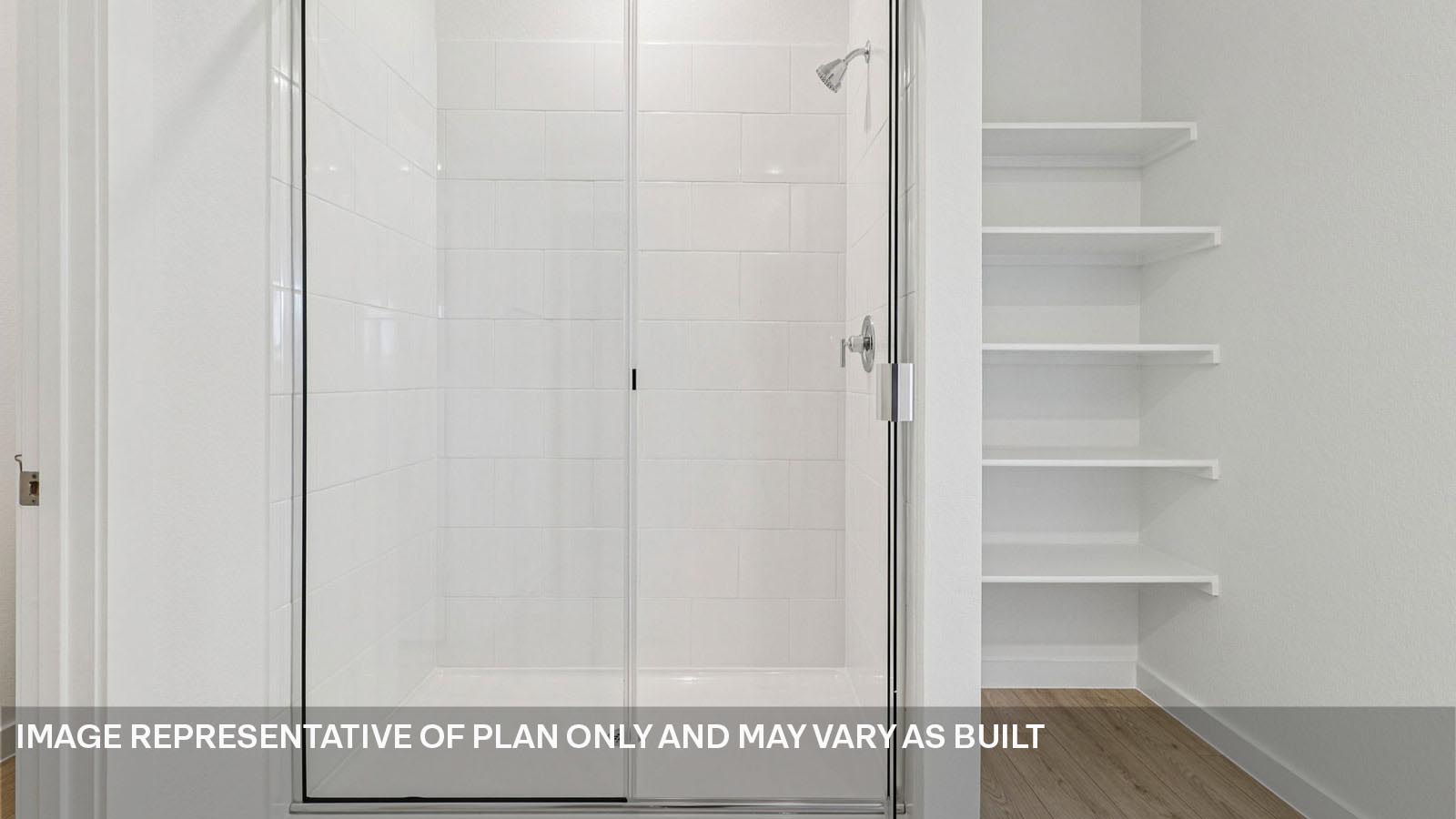 Walk-in shower in primary bathroom.