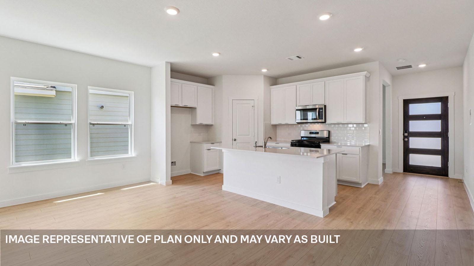 Gourmet kitchen with quartz countertops.